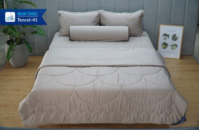 Lựa chọn chăn mền dày có trọng lượng nặng một chút sẽ giúp bạn ngủ ngon giấc hơn 